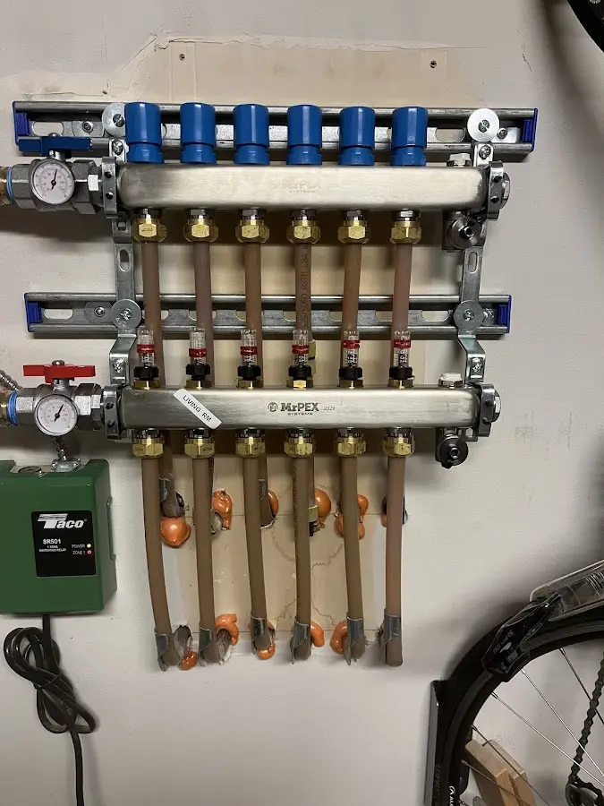 Plumber performing Gas Line Installation at a residential property in Wellesley